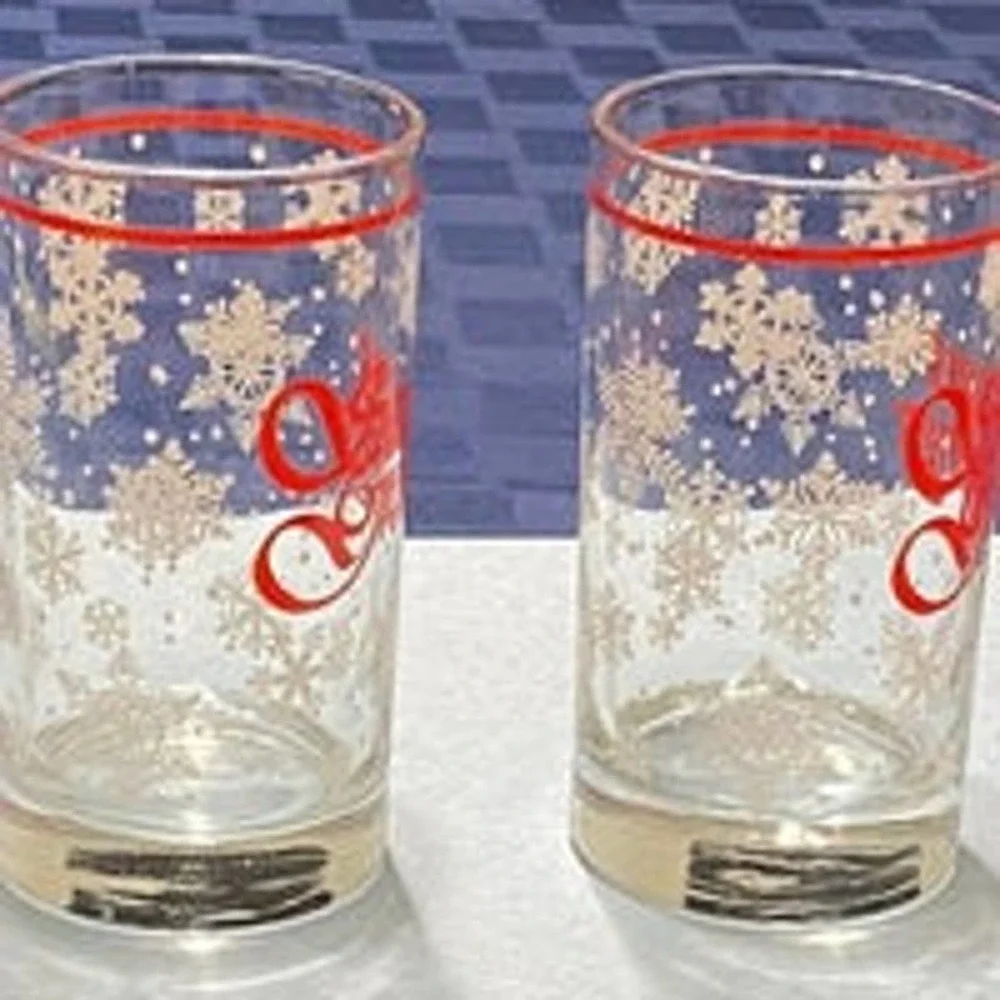 Set of two Season's Greetings holiday drinking glasses, retro Christmas snowflak